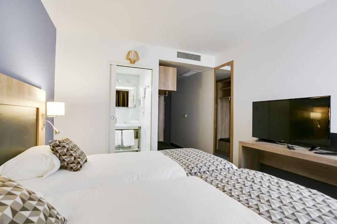 Brit Hotel Confort לוצ'ס מראה חיצוני תמונה